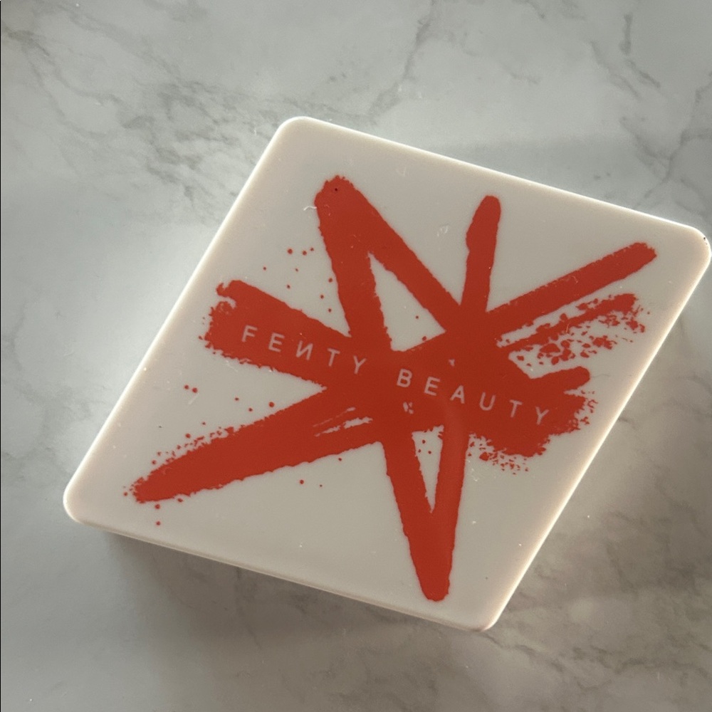 Fenty Beauty Compact with Bold Red Design